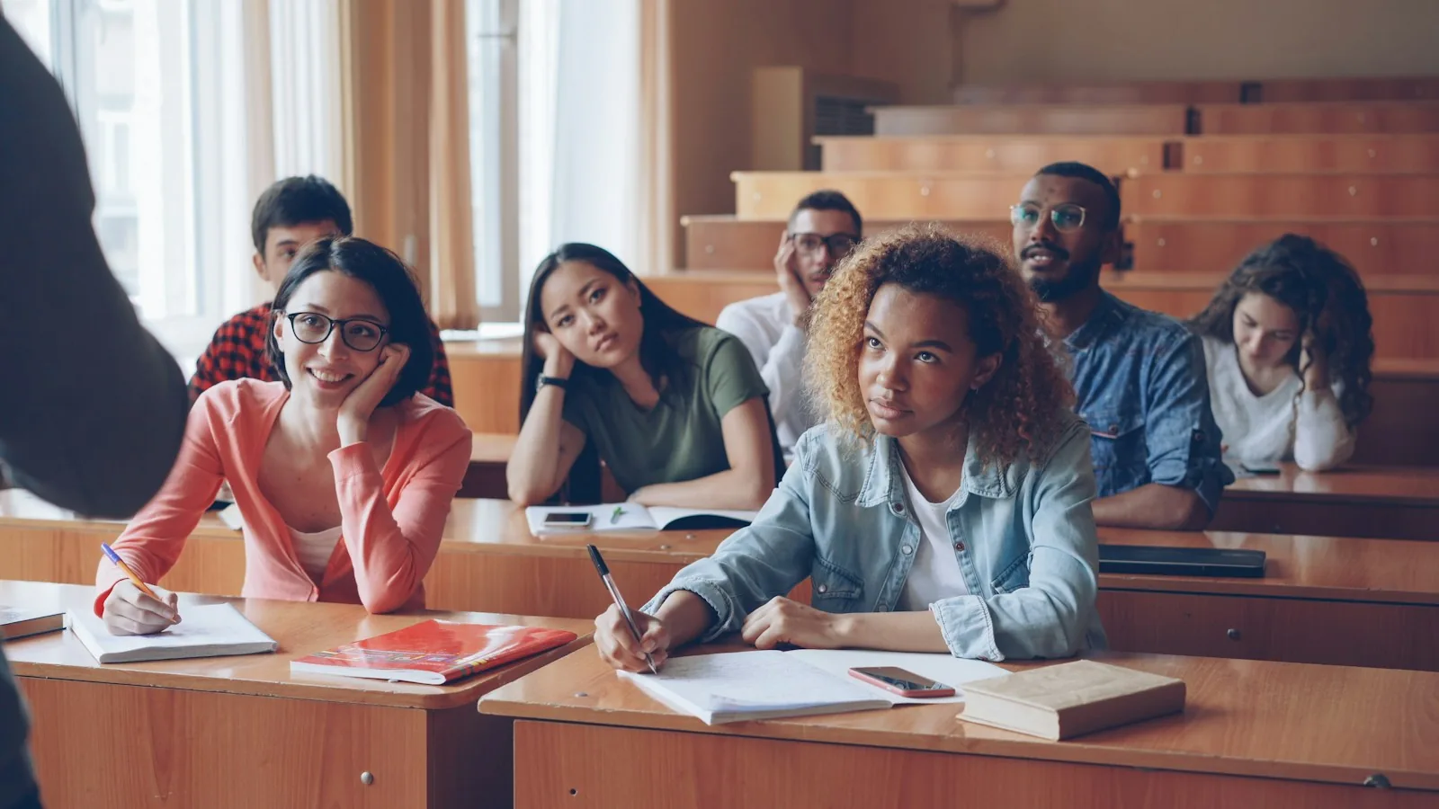 Students listening in a lecture hall